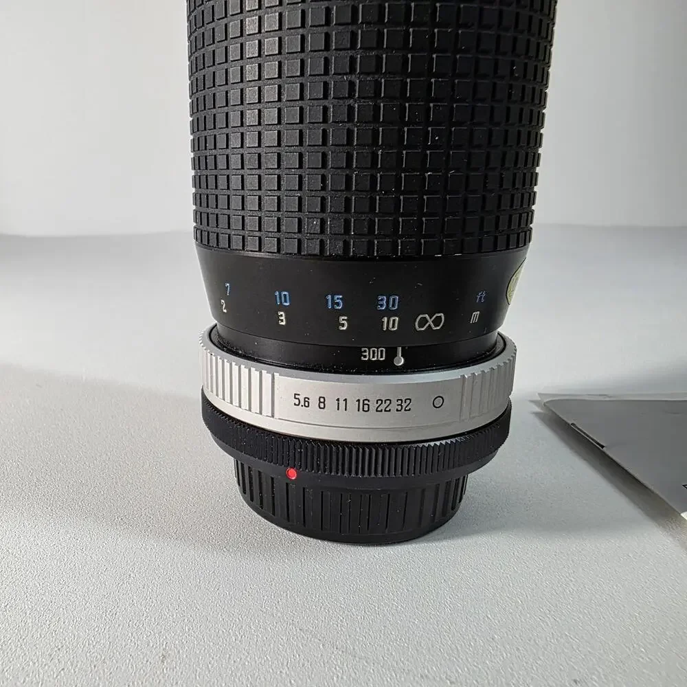 HOYA HMC 100-300MM F 5.6 ZOOM LENS FOR CANON